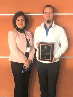 Dr Gregoire Ruffenach receiving the 2019 Chancellor’s Award
