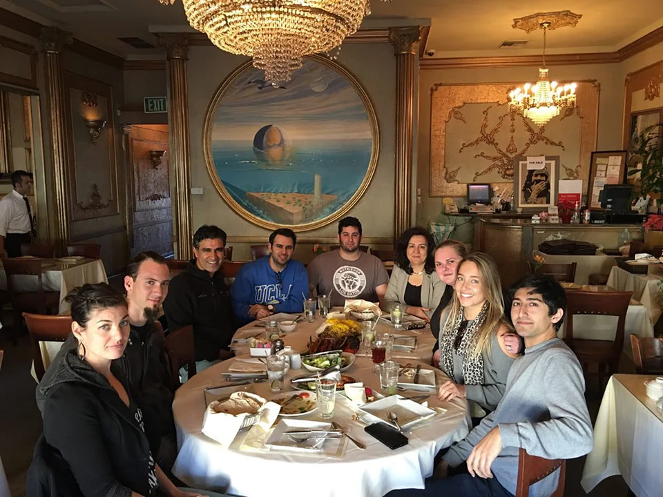 Group sitting at restaurant table
