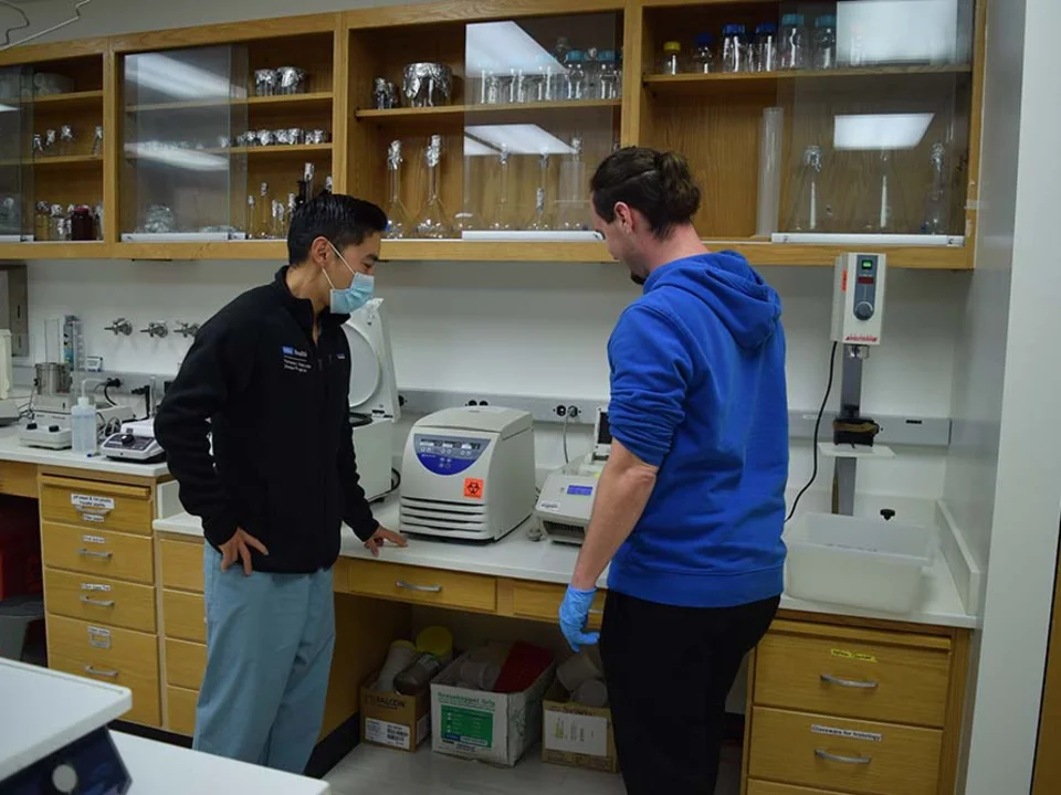 Two men working in lab